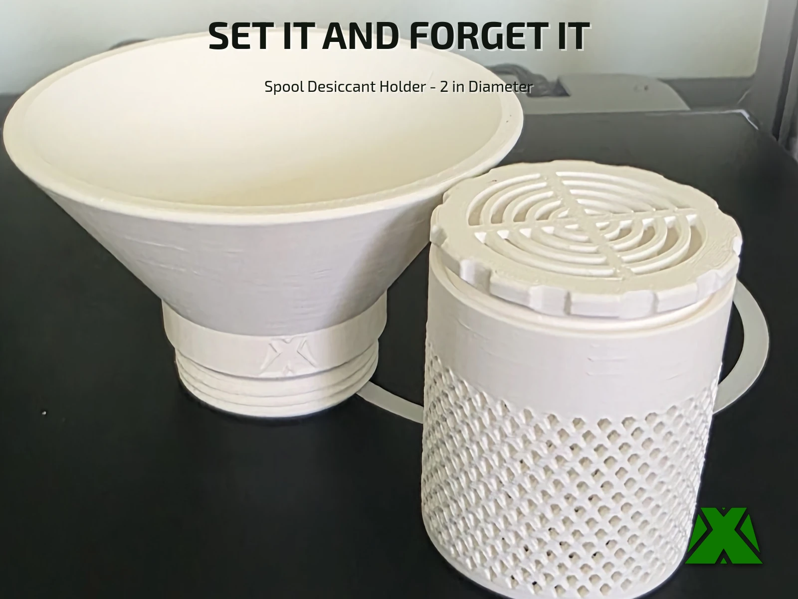 The white printed container with its vented screw-on lid standing beside the wide filling funnel on a dark desk