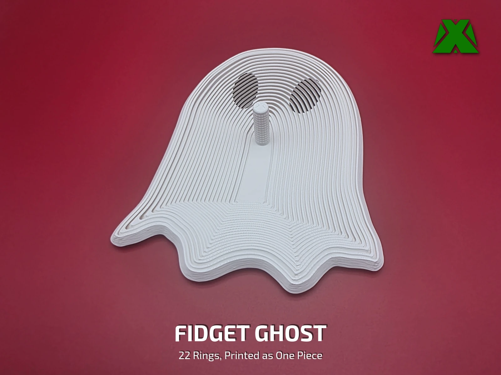 A white fidget ghost lying flat on a deep red backdrop, its nested rings stepping out to a wavy hem, with two dark eyes and a textured stem standing up