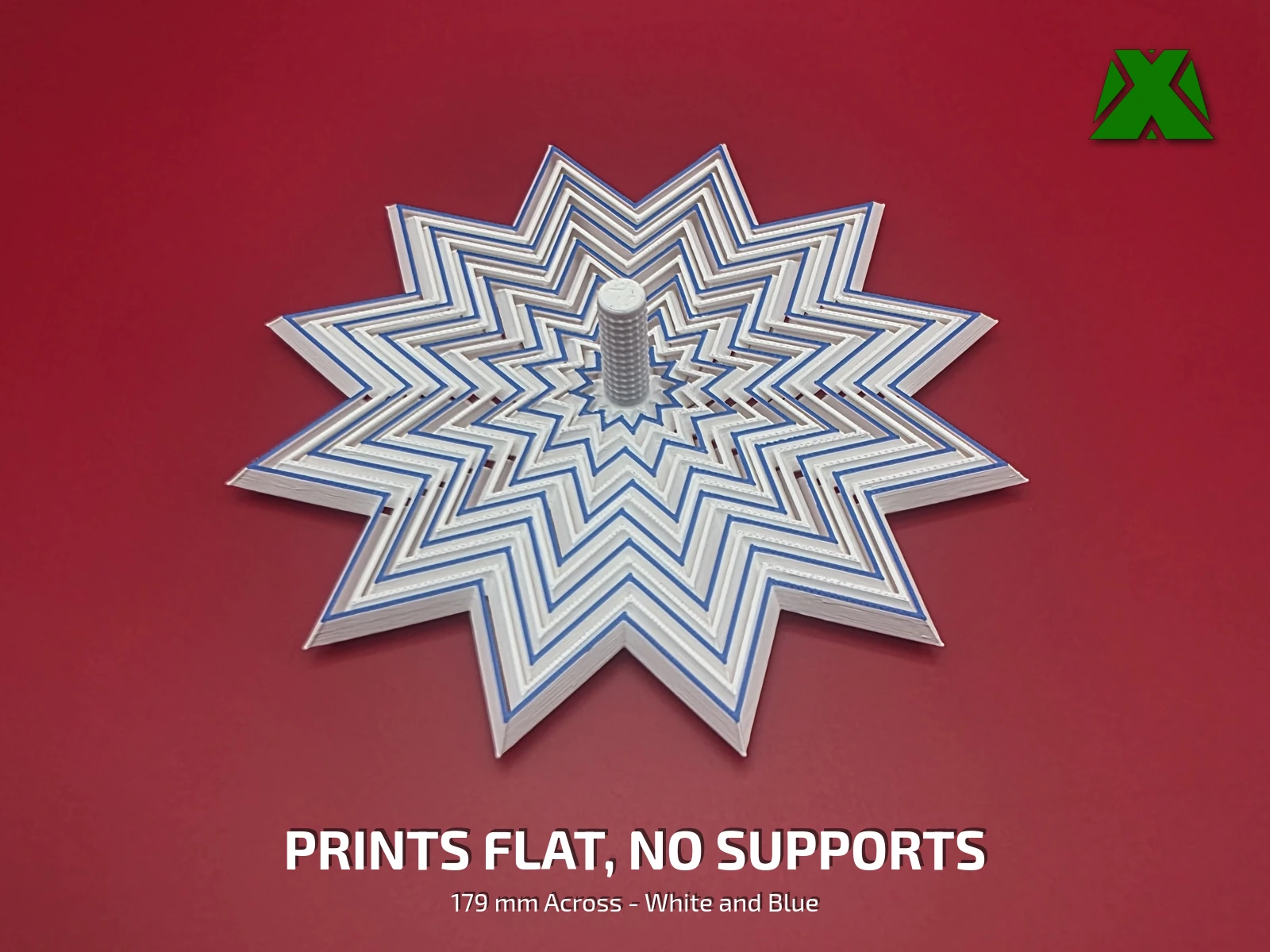 The fidget snowflake lying flat with every ring lined up, showing the twelve straight-sided points and the blue stripe on each ring