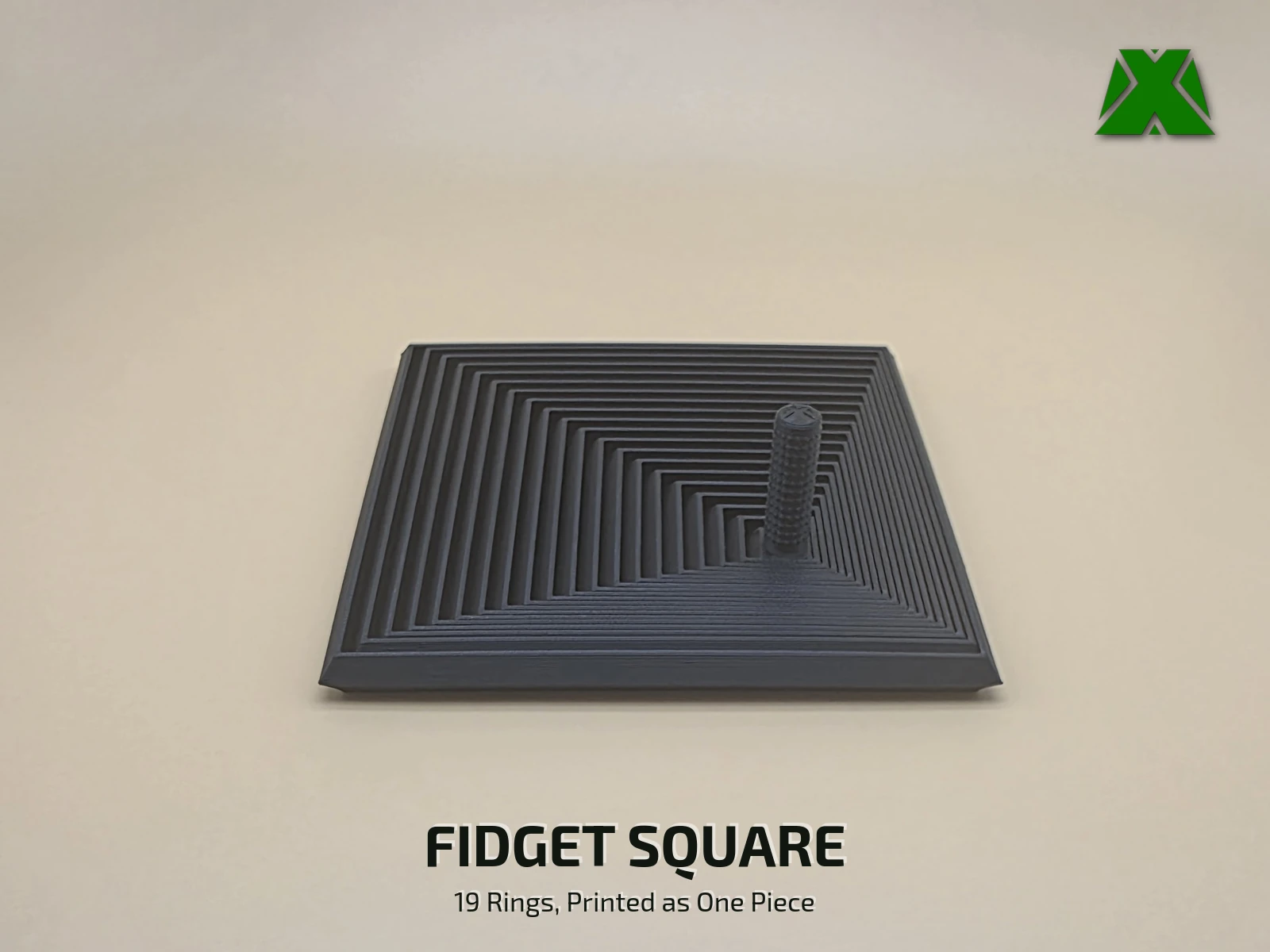 A black print-in-place fidget square lying flat on a tan backdrop, its 19 nested square rings stepping out from a short textured stem
