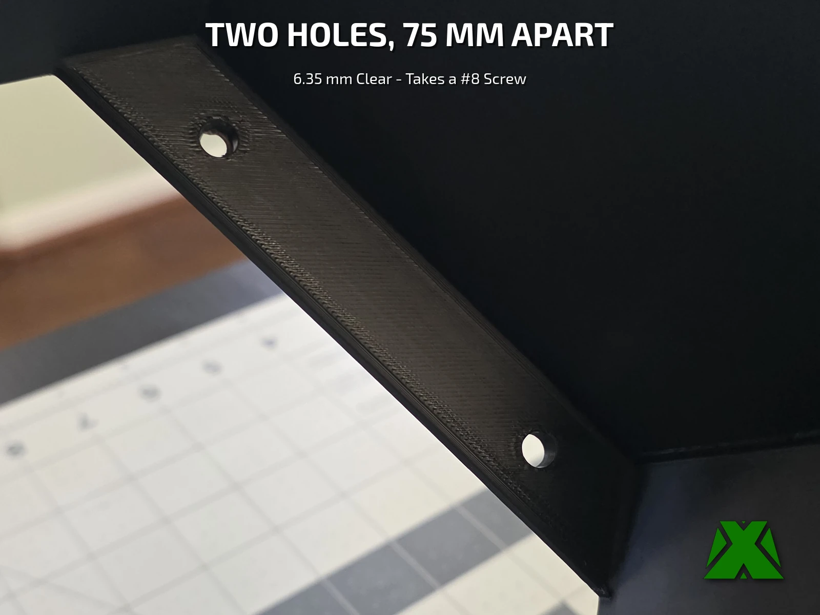 Close view of the printed mounting plate inside the shelf, with its two countersunk screw holes