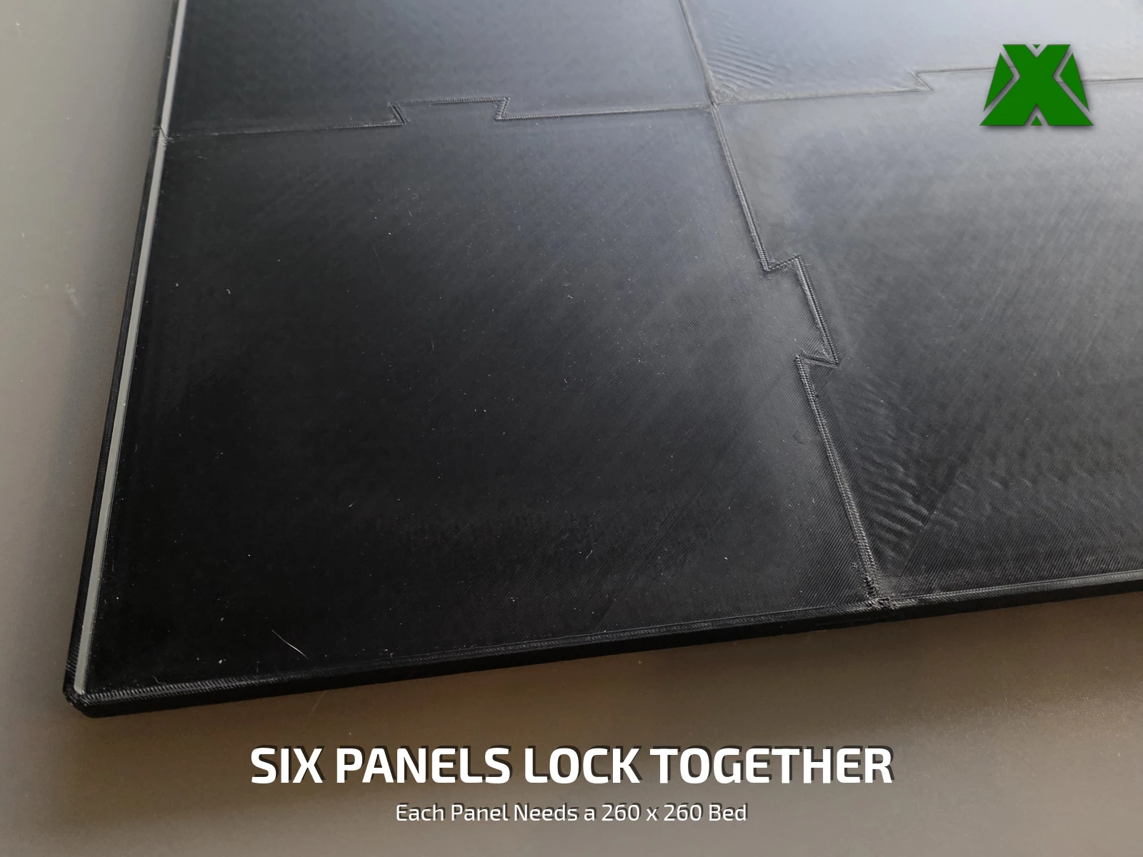 Close view of one corner of the tray, showing the rim and the stepped tabs that key the panels together