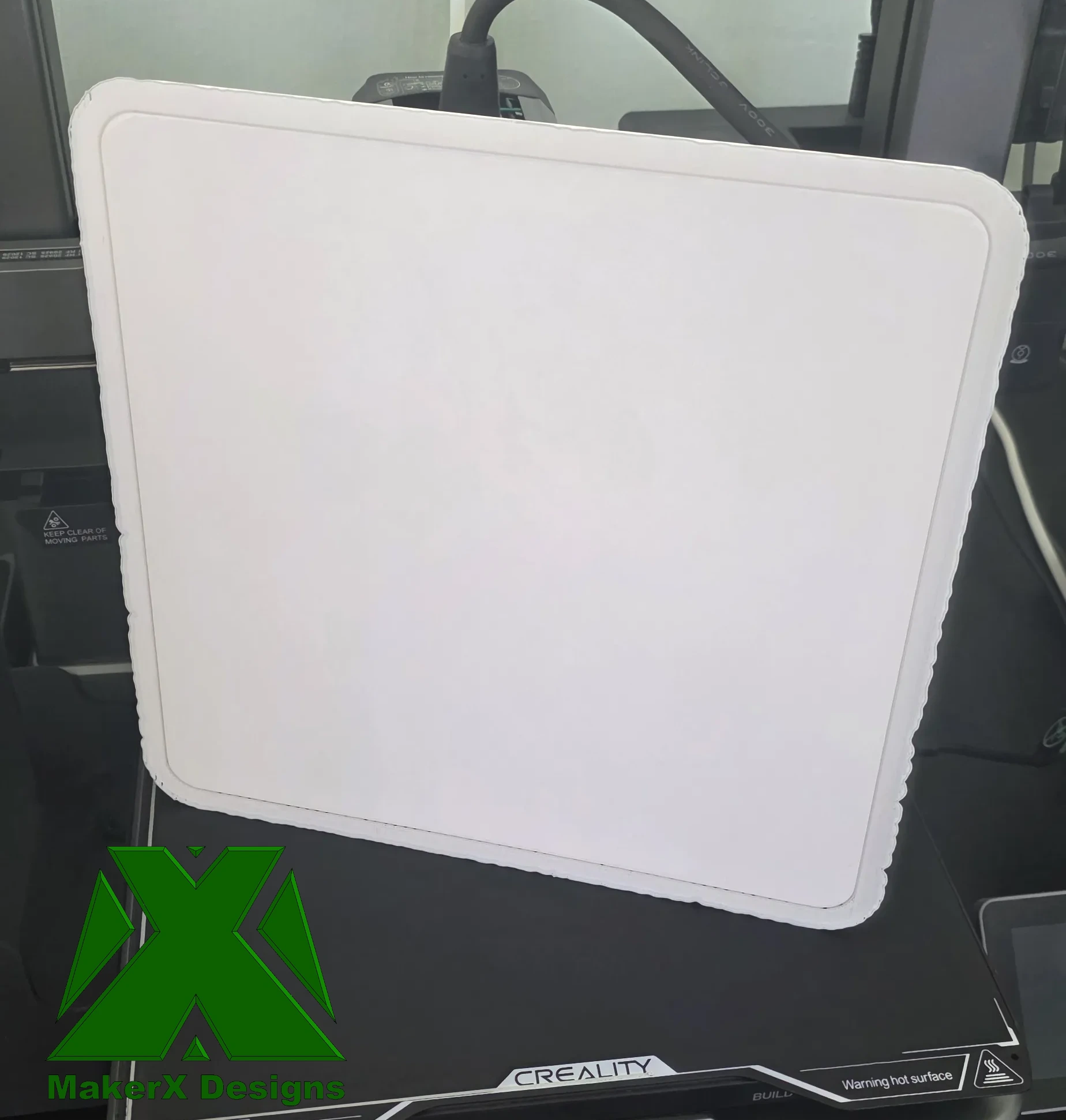 Puzzle tray lid removed from build plate