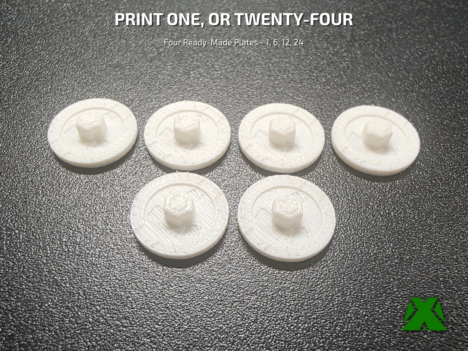 Six caps on the textured build plate, press-fit boss upward, each still ringed by its brim